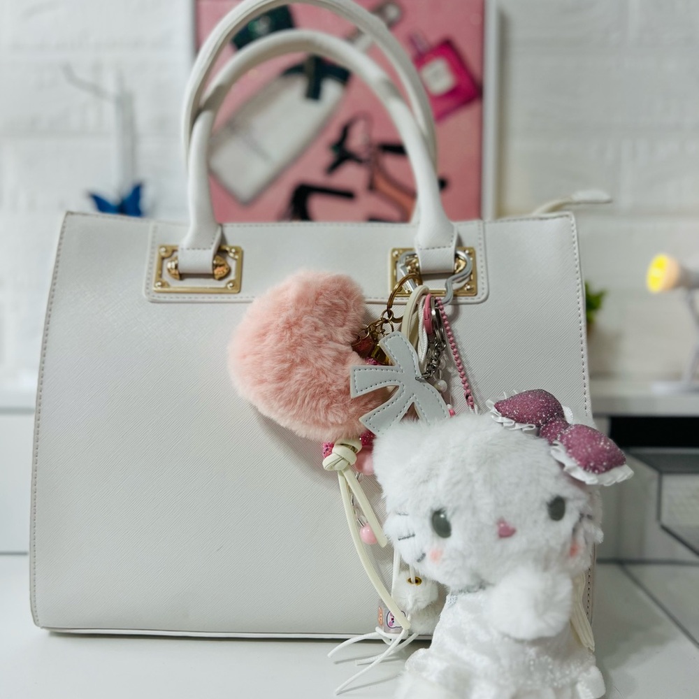 Sanrio Plush white angel with Glittery pink bow. Can be used as bag charm.